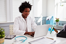 Female-physician-laptop
