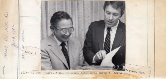 Montgomery County Medical Society (1982) - L-R- Tom Tamaki, MD, Chairman talks with Jerry L. Rothenberger, PMS.